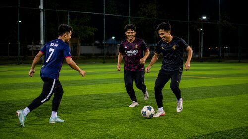 Football players training on the SJM1 Arena turf